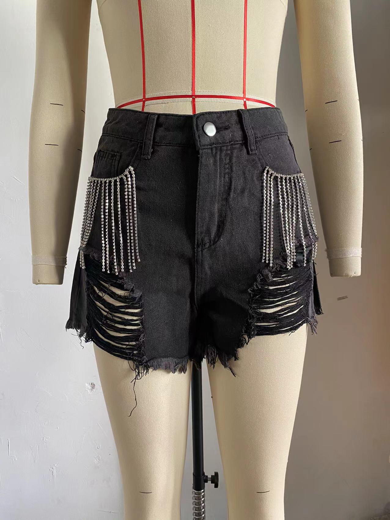 Ropa de mujer Llegada Casual Borla de cadena Pantalones cortos de mezclilla rasgados