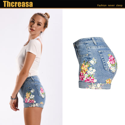 Ropa de mujer Pantalones cortos elásticos de pierna ancha Ropa de mujer Pantalones cortos de mezclilla florales bordados exquisitos en 3D Mujer