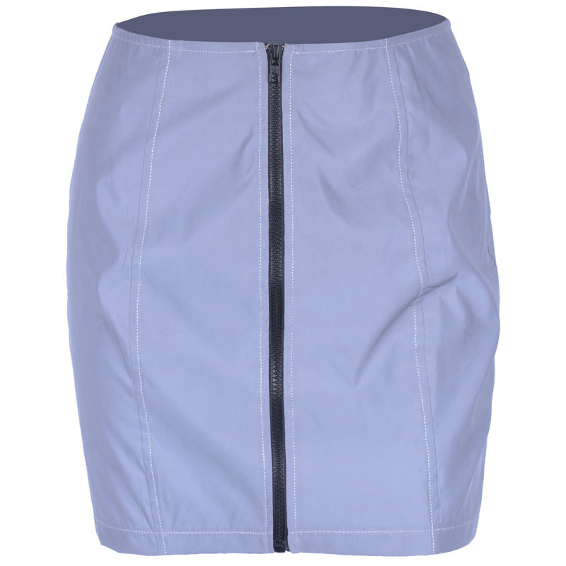 Fashionable sexy lady slim buttocks short reflective skirt