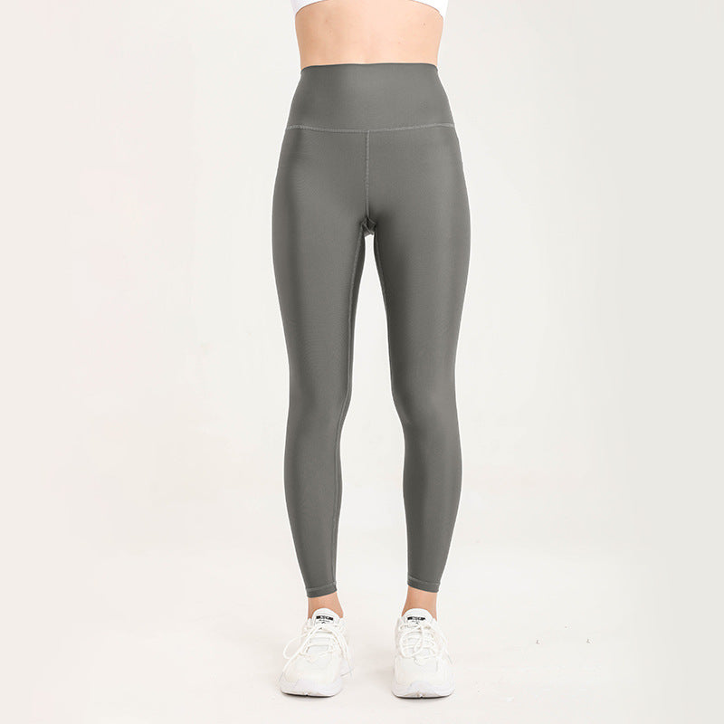 Pantalones de Yoga coloridos para otoño e invierno, mallas deportivas para Yoga para mujer, agradables a la piel, sensación desnuda brillante, cintura alta, melocotón, levantamiento de cadera