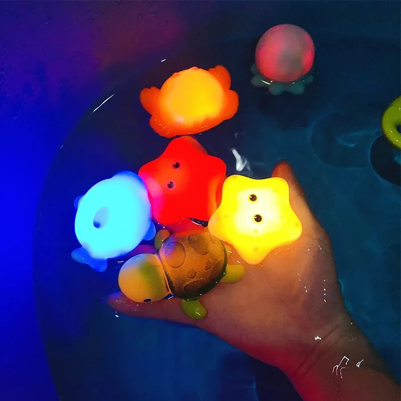 Juego de agua de lavado de animales resplandeciente, red de luz de agua flotante, pesca, peces, juguetes para jugar en el agua, juguetes de baño para bebés flotantes